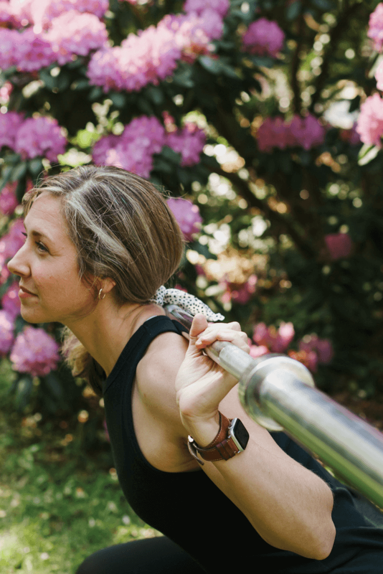 woman with weights outside with healthy habits